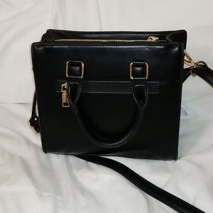 SOLD Black and gold purse